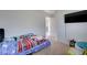 Charming bedroom with TV and toys at 152 Belmont Canyon Pl, Henderson, NV 89015