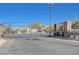 Gated community entrance with stone pillars and lights at 152 Belmont Canyon Pl, Henderson, NV 89015