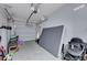 Garage interior with storage and a mattress at 152 Belmont Canyon Pl, Henderson, NV 89015