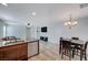 Open concept kitchen with island and stainless steel appliances at 152 Belmont Canyon Pl, Henderson, NV 89015