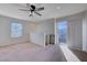 Loft with sliding glass door to balcony and ceiling fan at 152 Belmont Canyon Pl, Henderson, NV 89015