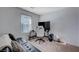 Home office with desk, chair, and sleeper sofa at 152 Belmont Canyon Pl, Henderson, NV 89015
