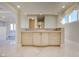 Bathroom featuring dual vanity with classic cabinetry and a large mirror at 1549 Foothills Village Dr, Henderson, NV 89012