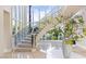 Grand foyer with a winding staircase, high ceilings, and marble floors at 1549 Foothills Village Dr, Henderson, NV 89012