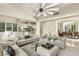 Open-concept living room leading to the kitchen and dining area at 1549 Foothills Village Dr, Henderson, NV 89012
