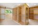 Spacious walk-in closet with custom built-ins and ample storage at 1549 Foothills Village Dr, Henderson, NV 89012