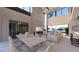 Open concept dining room with a large table and wine storage at 168 Still Shores St, Henderson, NV 89011