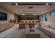 Relaxing game room with a wet bar and comfortable seating at 168 Still Shores St, Henderson, NV 89011