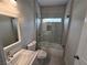 Updated bathroom with a bathtub, shower, and modern vanity at 1770 Ironside St, Pahrump, NV 89048