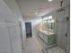 Elegant bathroom with double vanity, large shower, and modern fixtures at 1770 Ironside St, Pahrump, NV 89048