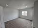 Spacious bedroom featuring neutral wall paint and plush carpeting at 1770 Ironside St, Pahrump, NV 89048