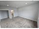 Large bedroom with carpet, an ensuite bathroom, and walk in closet at 1770 Ironside St, Pahrump, NV 89048