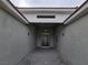 Modern entryway with gray walls and black front door at 1770 Ironside St, Pahrump, NV 89048