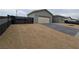 New construction home with modern gray exterior and black gate at 1770 Ironside St, Pahrump, NV 89048