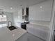 Modern kitchen with white cabinets and stainless steel appliances at 1770 Ironside St, Pahrump, NV 89048