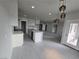 Modern kitchen features white cabinets, breakfast bar, and spacious layout at 1770 Ironside St, Pahrump, NV 89048