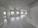 Spacious living room with gray walls and wood-look floors at 1770 Ironside St, Pahrump, NV 89048