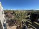 Aerial view showcasing the property's location near shops and mountains at 2260 Village Walk Dr # 1309, Henderson, NV 89052