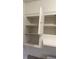 Open white cabinets above the kitchen counter at 2517 Cedar Ave, Las Vegas, NV 89101