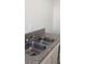 Double stainless steel kitchen sink with granite countertop at 2517 Cedar Ave, Las Vegas, NV 89101