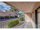 View of the outdoor area with a cozy patio, garden, and glimpses of nearby buildings at 2851 S Valley View Blvd # 1195, Las Vegas, NV 89102