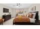 Inviting bedroom featuring a dark wood dresser, and a large window with a view of the outdoors at 2851 S Valley View Blvd # 1195, Las Vegas, NV 89102