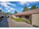 Tan single story house with a red roof and a gravel landscape on a sunny day at 2851 S Valley View Blvd # 1195, Las Vegas, NV 89102