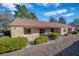 Attractive single story house with a red roof and a well maintained gravel and bush landscape at 2851 S Valley View Blvd # 1195, Las Vegas, NV 89102