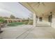 Covered patio with artificial turf and landscaped backyard at 2951 Maffie St, Henderson, NV 89052