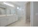 Clean bathroom with double sinks, shower, and toilet at 2951 Maffie St, Henderson, NV 89052