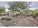 Single story home with attached garage and landscaped yard at 2951 Maffie St, Henderson, NV 89052