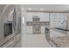 Updated kitchen, featuring stainless steel appliances and granite at 2951 Maffie St, Henderson, NV 89052