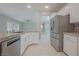 Modern kitchen featuring granite countertops and white cabinets at 2951 Maffie St, Henderson, NV 89052