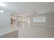 Open living space with tile floors and a view of the kitchen at 2951 Maffie St, Henderson, NV 89052
