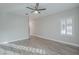 Bright living room with hardwood floors and plantation shutters at 2951 Maffie St, Henderson, NV 89052