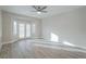 Spacious living room with hardwood floors and access to backyard at 2951 Maffie St, Henderson, NV 89052