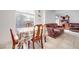 Bright dining area with table and chairs, adjacent to living room at 2983 Juniper Hills Blvd # 102, Las Vegas, NV 89142