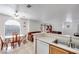 Kitchen with light wood cabinets, stainless steel appliances, and a double sink at 2983 Juniper Hills Blvd # 102, Las Vegas, NV 89142