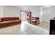Spacious living room featuring tile flooring and neutral paint at 2983 Juniper Hills Blvd # 102, Las Vegas, NV 89142