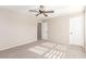 Spacious bedroom with ceiling fan and access to hallway at 3032 Gravino Ave, Henderson, NV 89044