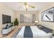 Bright bedroom featuring neutral decor, modern furnishings, and a ceiling fan at 3425 E Russell Rd # 227, Las Vegas, NV 89120