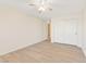 Bedroom featuring wood-look floors and neutral walls, as well as double closets at 3425 E Russell Rd # 227, Las Vegas, NV 89120