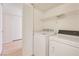 Laundry room featuring washer, dryer and shelving at 3425 E Russell Rd # 227, Las Vegas, NV 89120