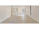 Open-concept living space, highlighting kitchen access and natural light at 3425 E Russell Rd # 227, Las Vegas, NV 89120