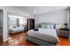 Bedroom with mirrored closet and a queen bed at 3585 Arville St # 402C, Las Vegas, NV 89103