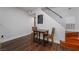 Small dining area with a table and chairs next to stairs at 3585 Arville St # 402C, Las Vegas, NV 89103