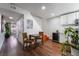 Bright dining area with wood floors and a charming table set at 3585 Arville St # 402C, Las Vegas, NV 89103