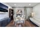 Dining area with white table and chairs, near living room at 3585 Arville St # 402C, Las Vegas, NV 89103