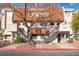 Attractive exterior of a two-story building with tiled roofs and stairs at 3585 Arville St # 402C, Las Vegas, NV 89103