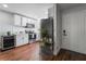 Modern kitchen with white cabinets and stainless steel appliances at 3585 Arville St # 402C, Las Vegas, NV 89103